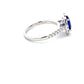 Tanzanite and Diamond Halo style Ring  Gardiner Brothers