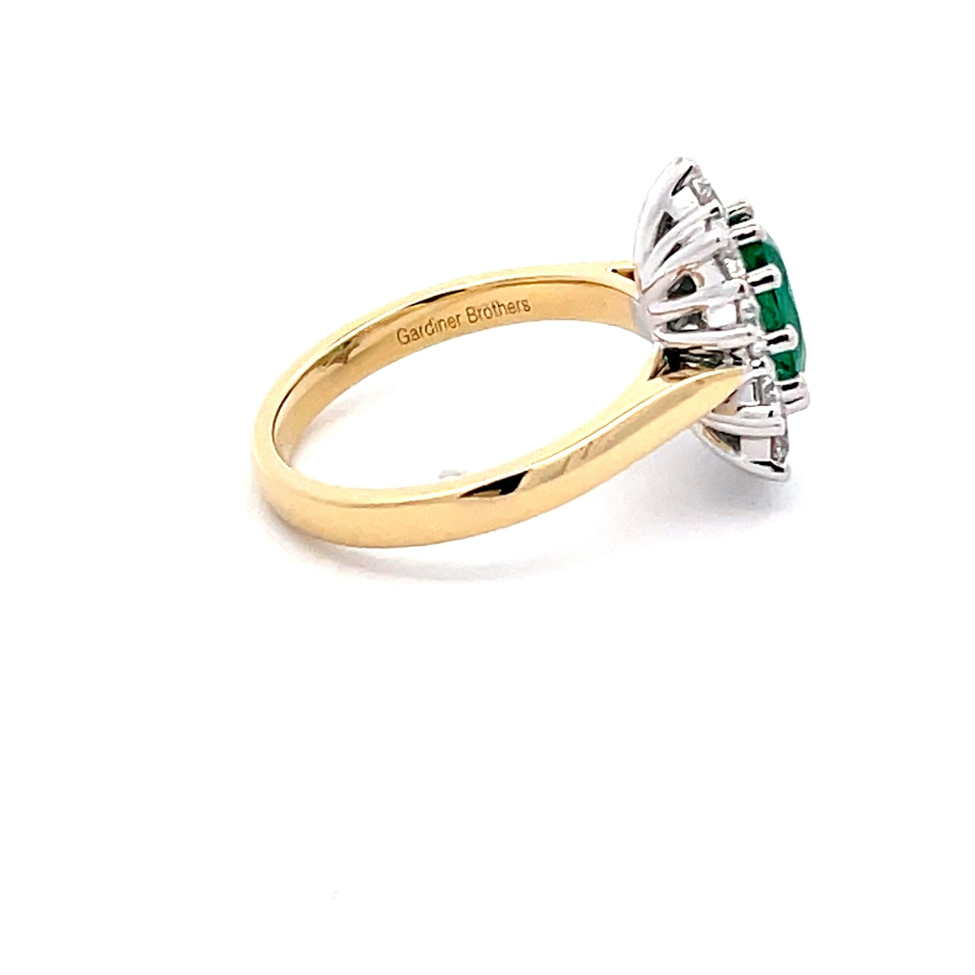 Emerald AND ROUND BRILLIANT CUT DIAMOND CLUSTER STYLE RING  Gardiner Brothers