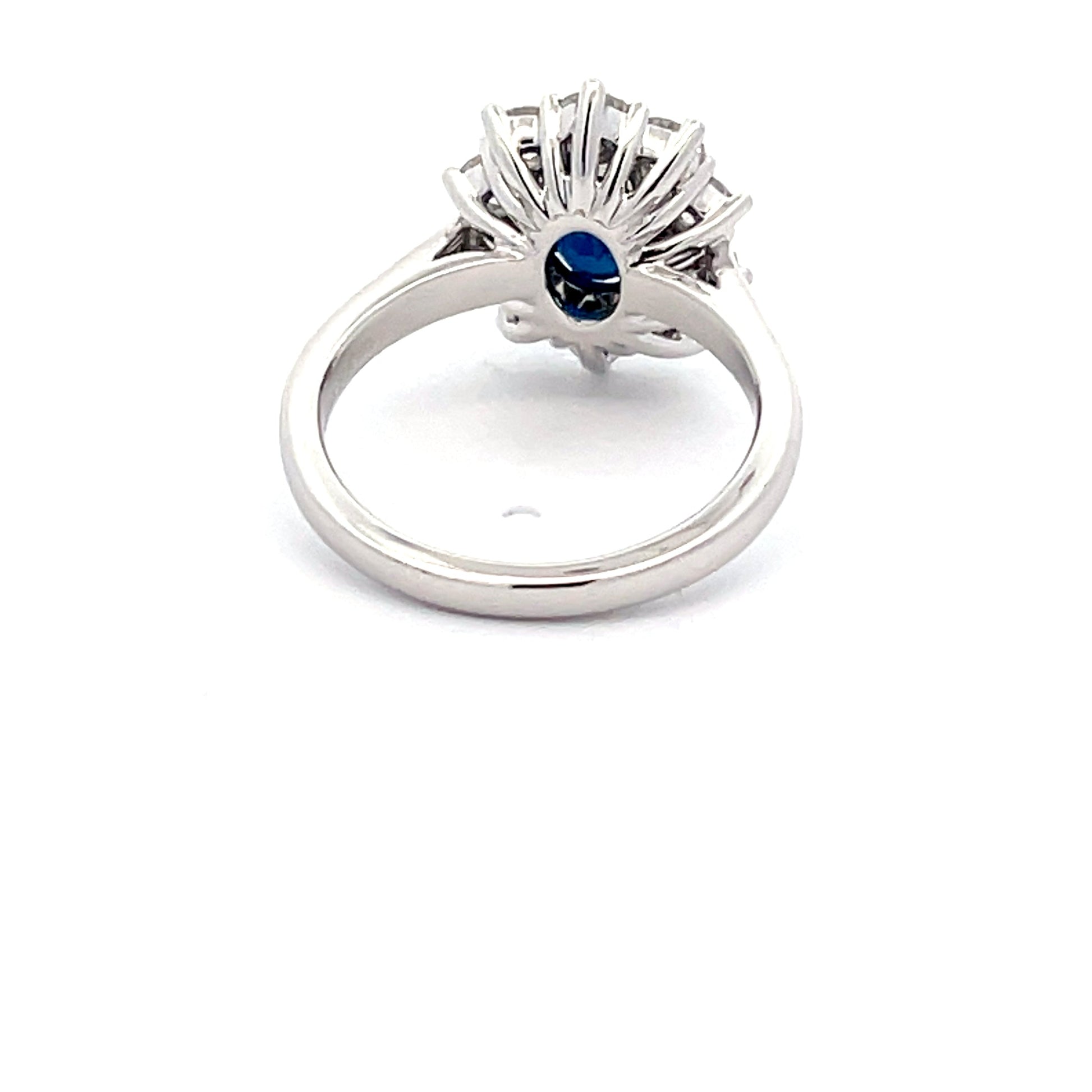 SAPPHIRE AND ROUND BRILLIANT CUT DIAMOND CLUSTER STYLE RING  Gardiner Brothers