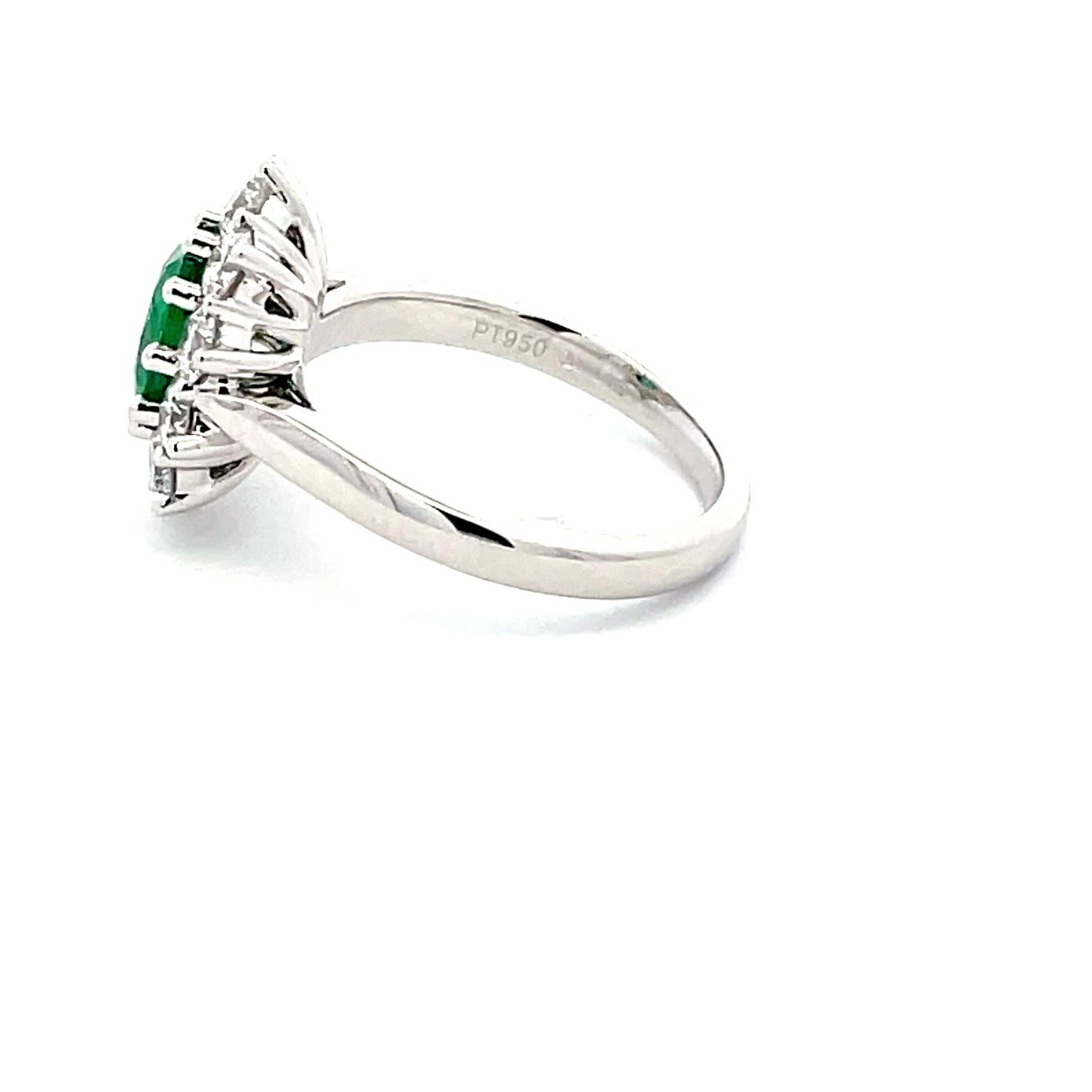 emerald  AND ROUND BRILLIANT CUT DIAMOND CLUSTER STYLE RING  Gardiner Brothers