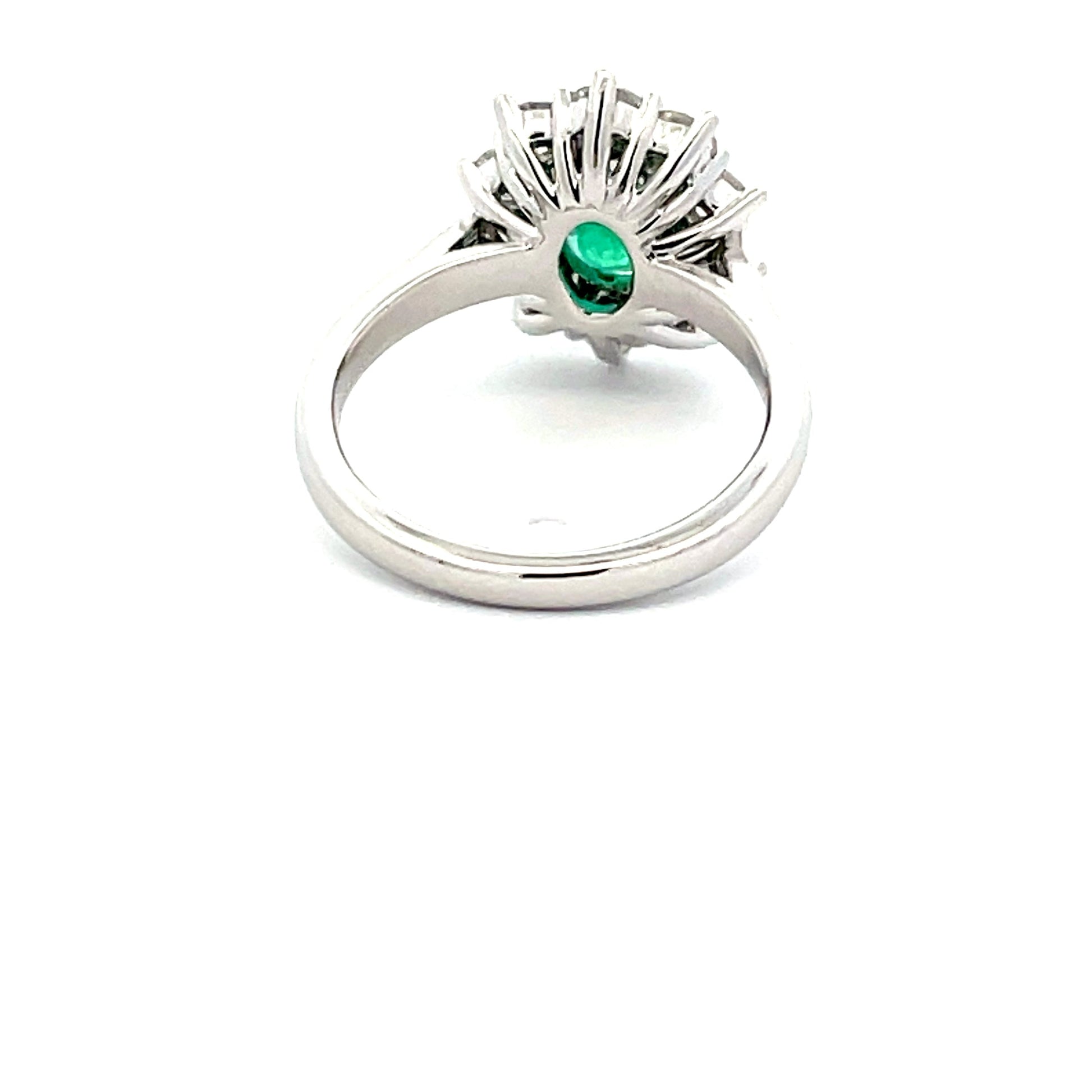 emerald  AND ROUND BRILLIANT CUT DIAMOND CLUSTER STYLE RING  Gardiner Brothers