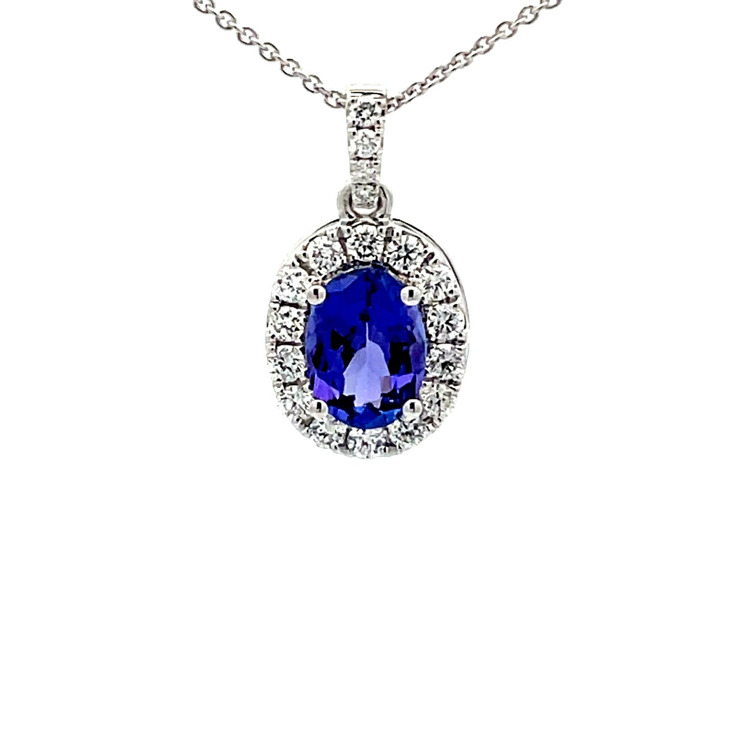 Tanzanite and diamond Halo Style Pendant  Gardiner Brothers