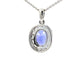 Tanzanite and diamond Halo Style Pendant  Gardiner Brothers