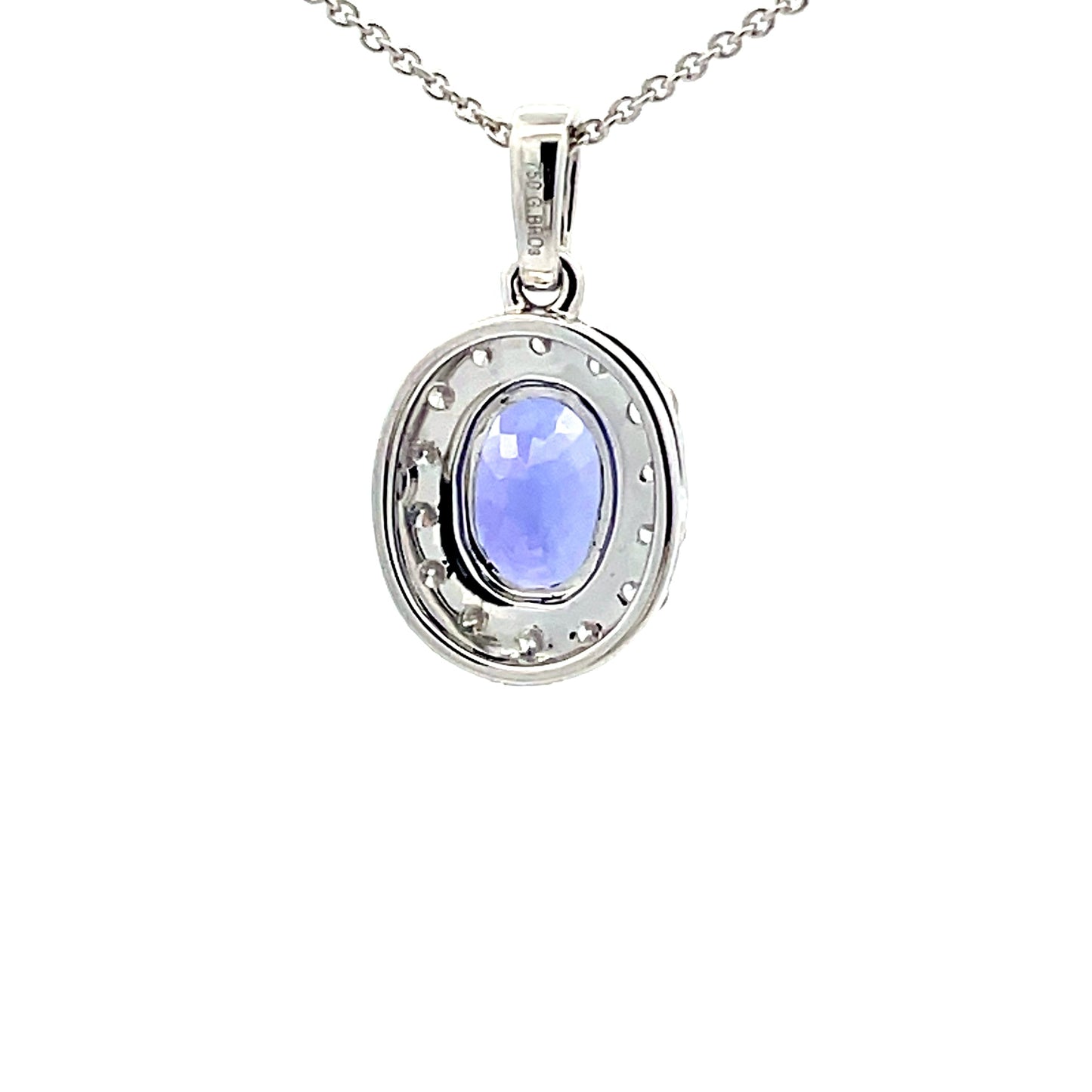 Tanzanite and diamond Halo Style Pendant  Gardiner Brothers