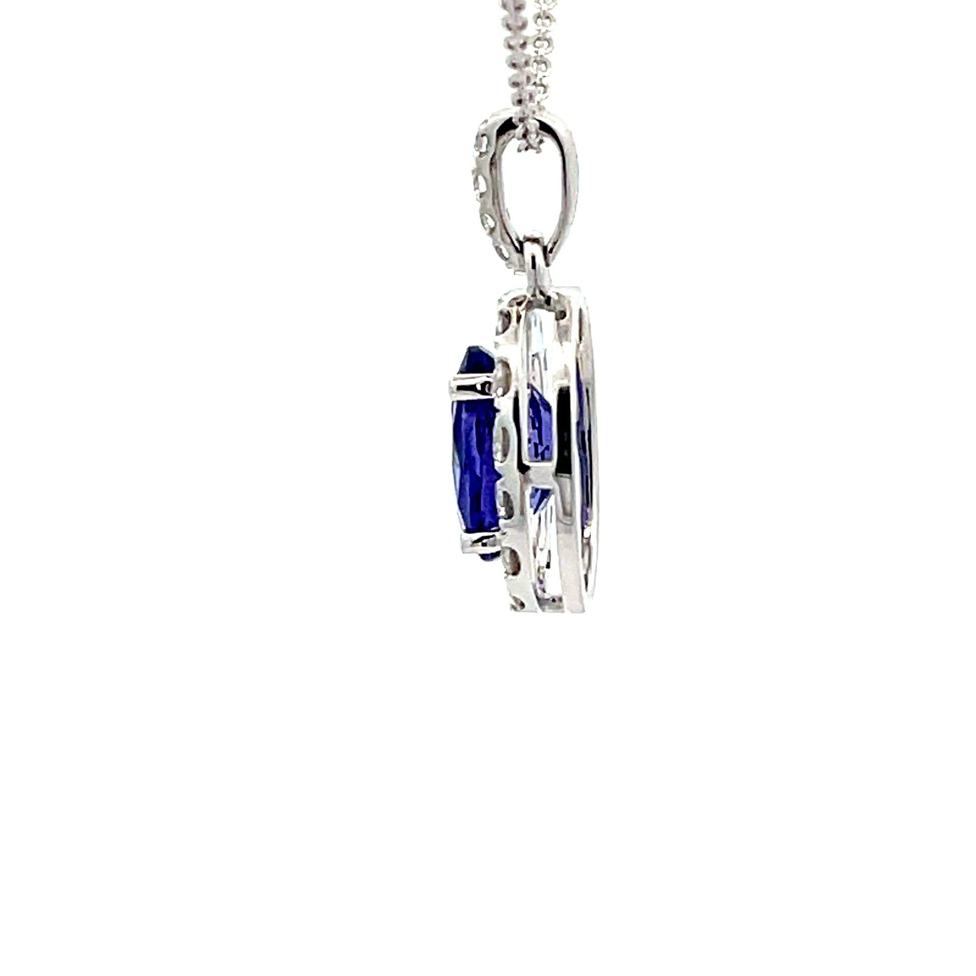 Tanzanite and diamond Halo Style Pendant  Gardiner Brothers