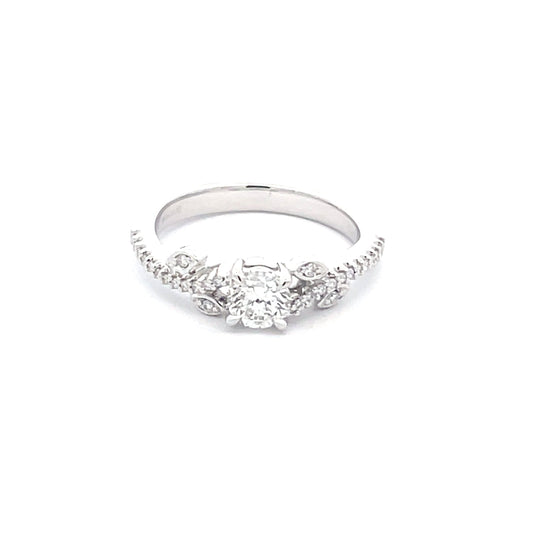 Round Brilliant Cut Diamond Solitaire with fancy diamond set shoulders - 0.65cts  Gardiner Brothers