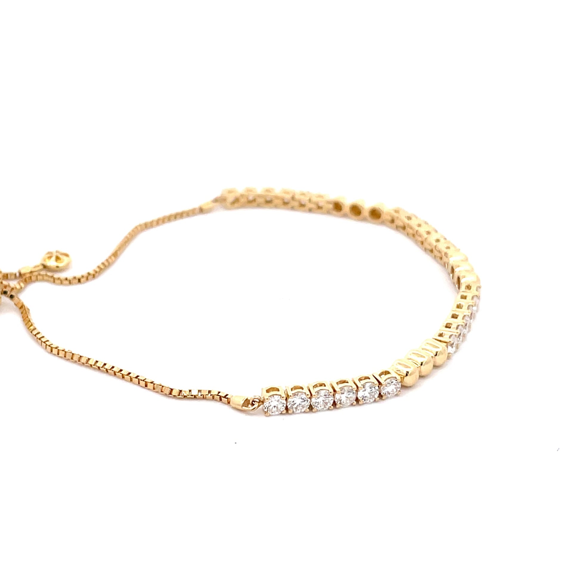 Yellow Gold Round Brilliant Cut Diamond and bead tennis style bracelet.  Gardiner Brothers