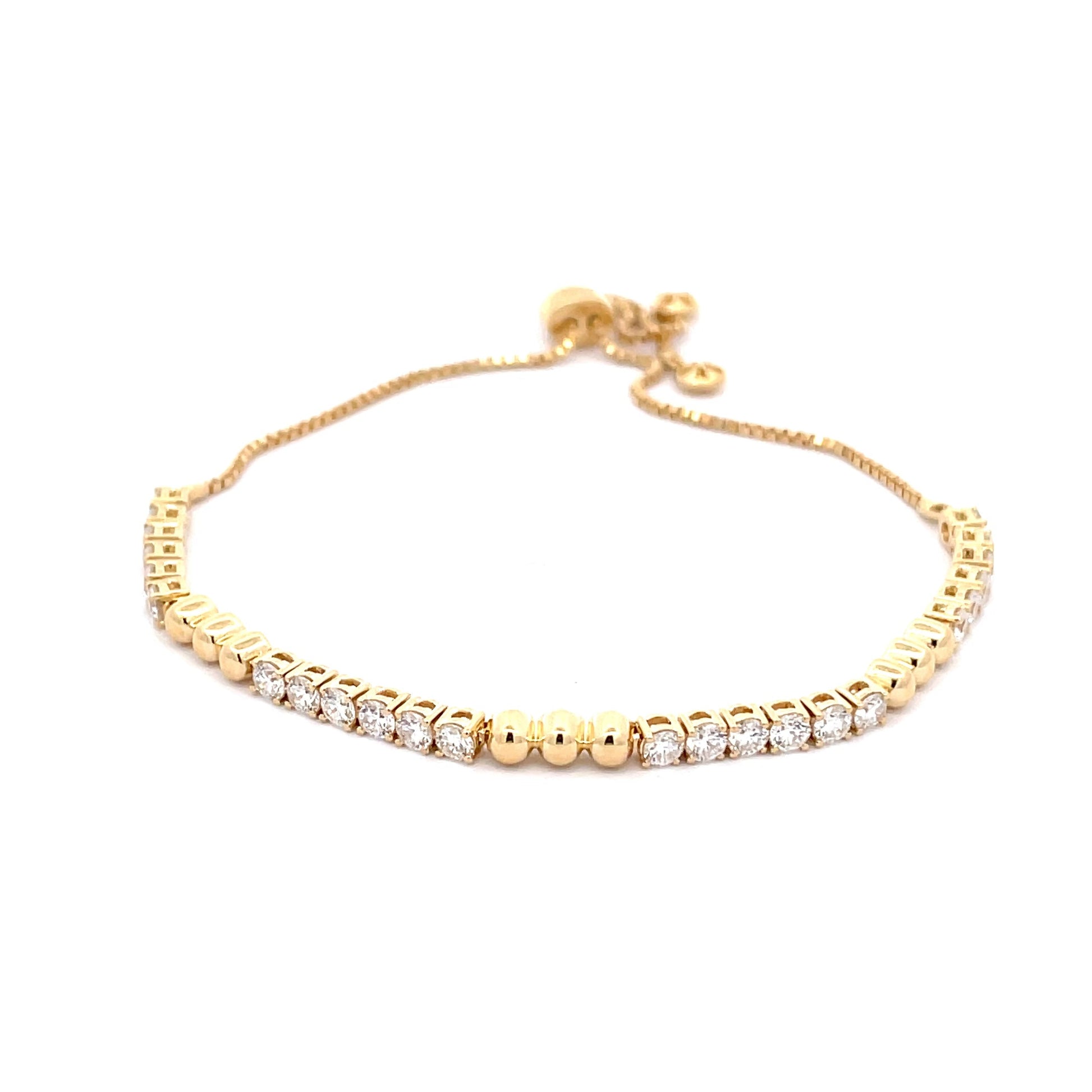 Yellow Gold Round Brilliant Cut Diamond and bead tennis style bracelet.  Gardiner Brothers