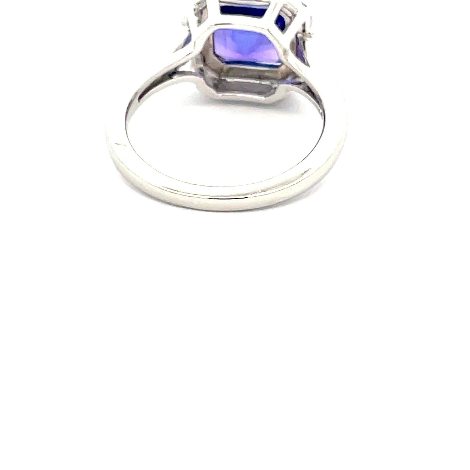 Tanzanite AND DIAMOND HALO RING  Gardiner Brothers