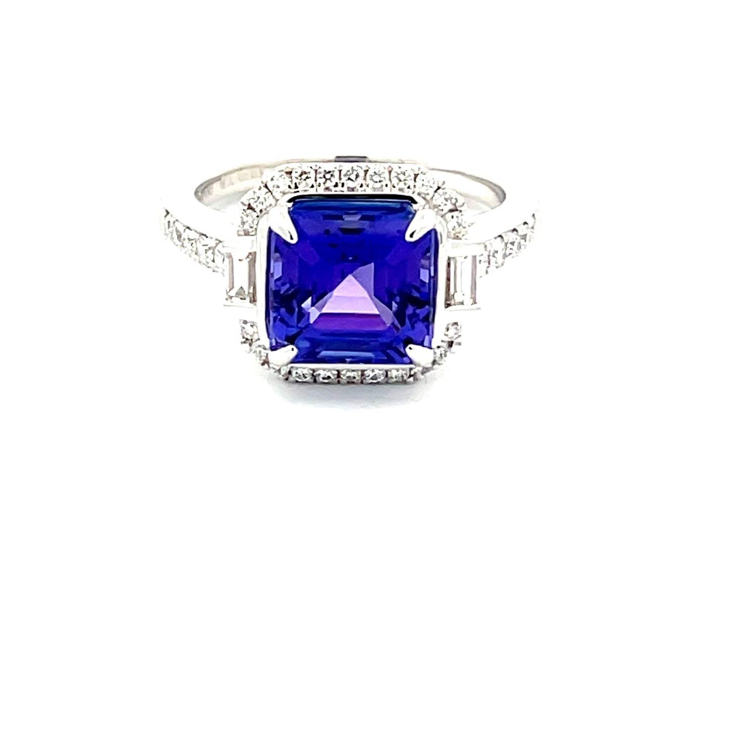 Tanzanite AND DIAMOND HALO RING  Gardiner Brothers