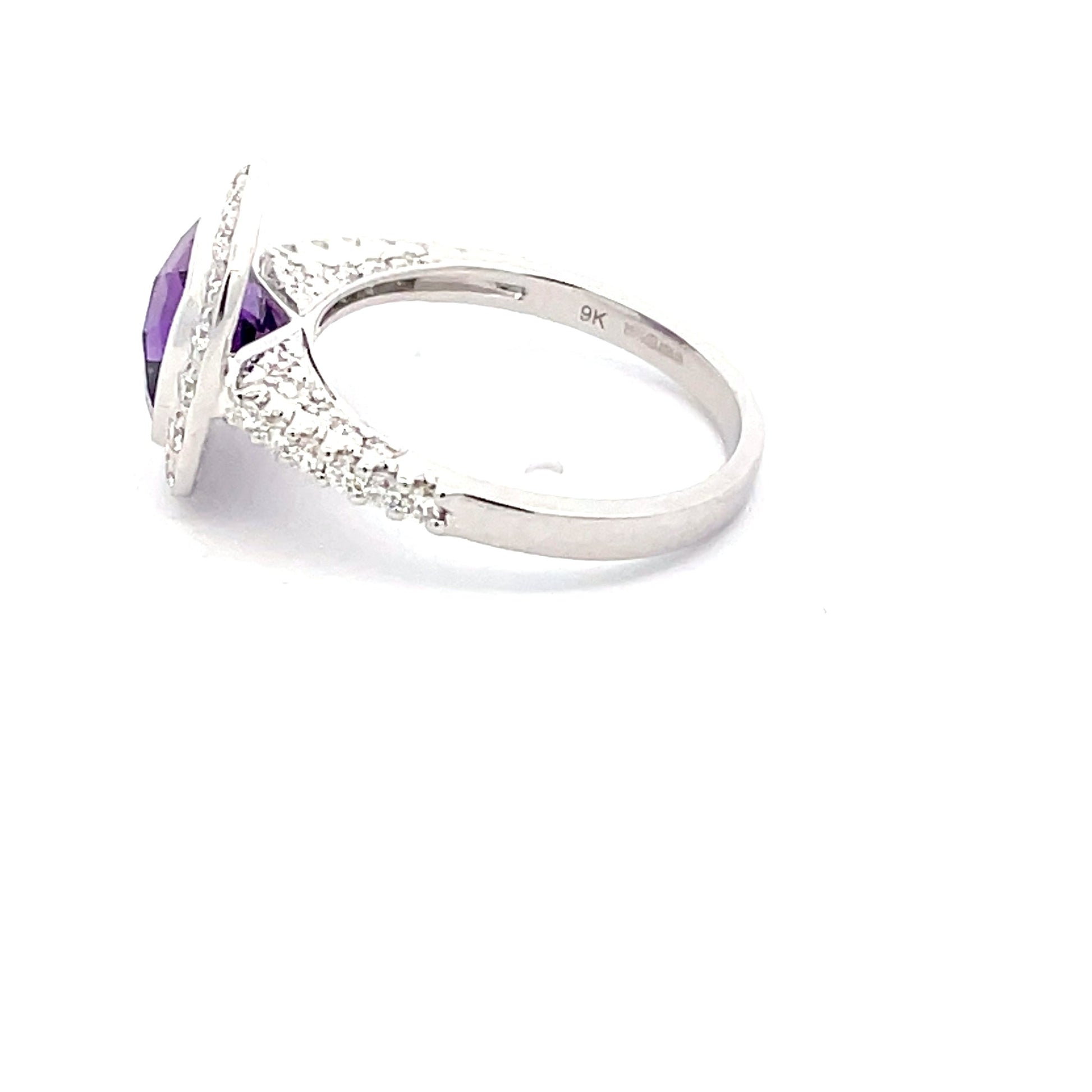 Amethyst and diamond halo style dress ring  Gardiner Brothers