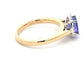 Tanzanite and round brilliant cut diamond halo ring  Gardiner Brothers