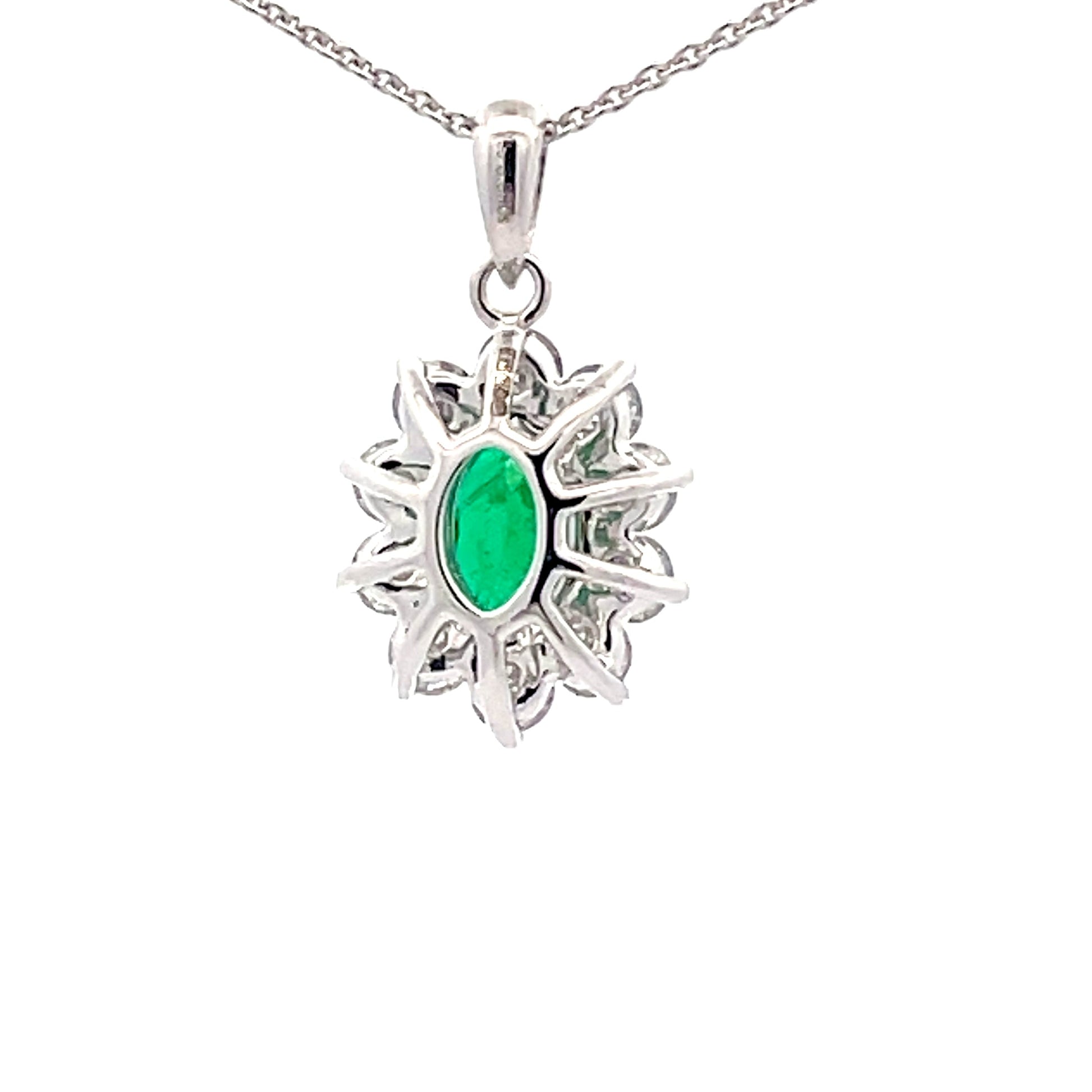 Emerald and Round brilliant cut diamond cluster style pendant  Gardiner Brothers