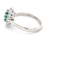 Emerald and round brilliant cut diamond cluster style ring  Gardiner Brothers
