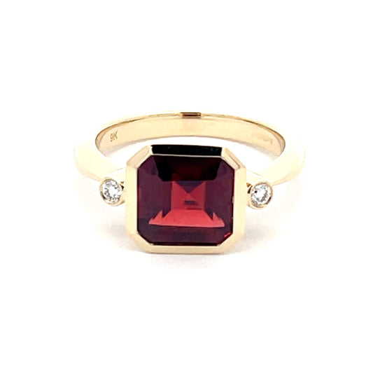 Garnet and Round brilliant Cut Diamond Ring  Gardiner Brothers