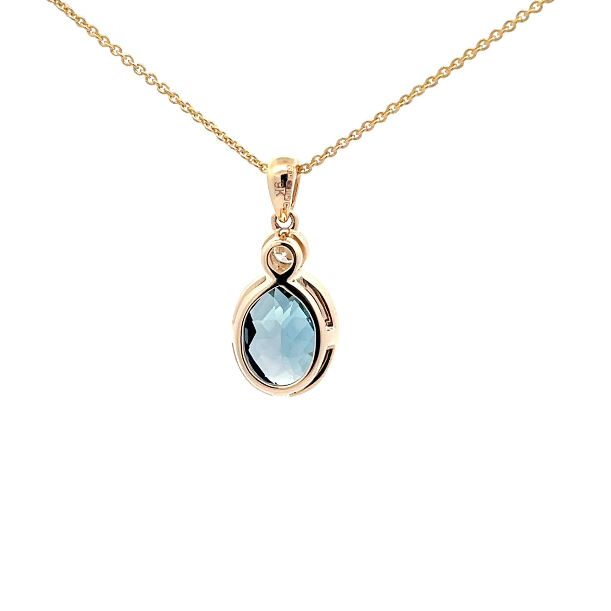 London Blue Topaz and Diamond Pendant  Gardiner Brothers