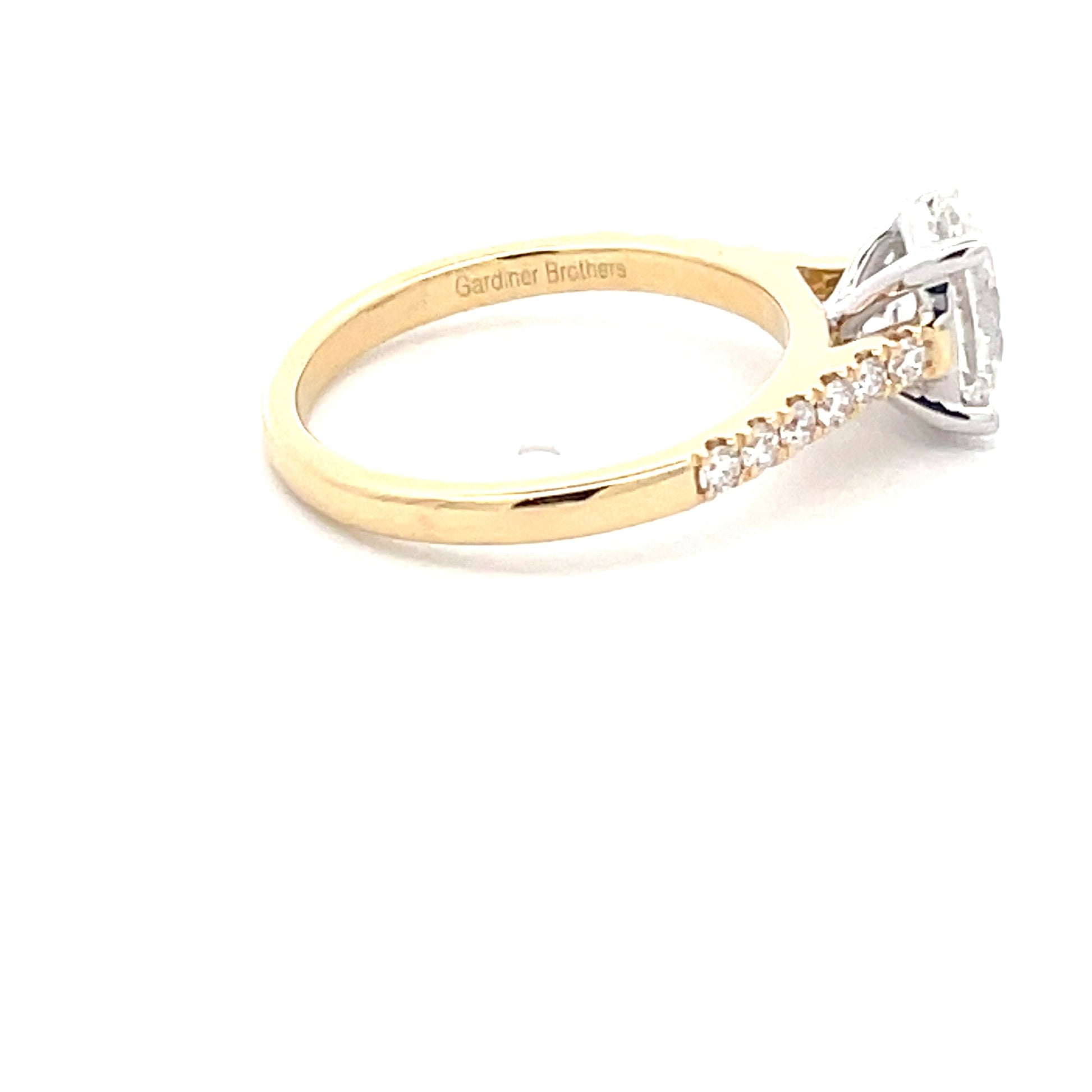 Oval Shaped Diamond Solitaire ring with diamond set shoulders - 1.45cts  Gardiner Brothers