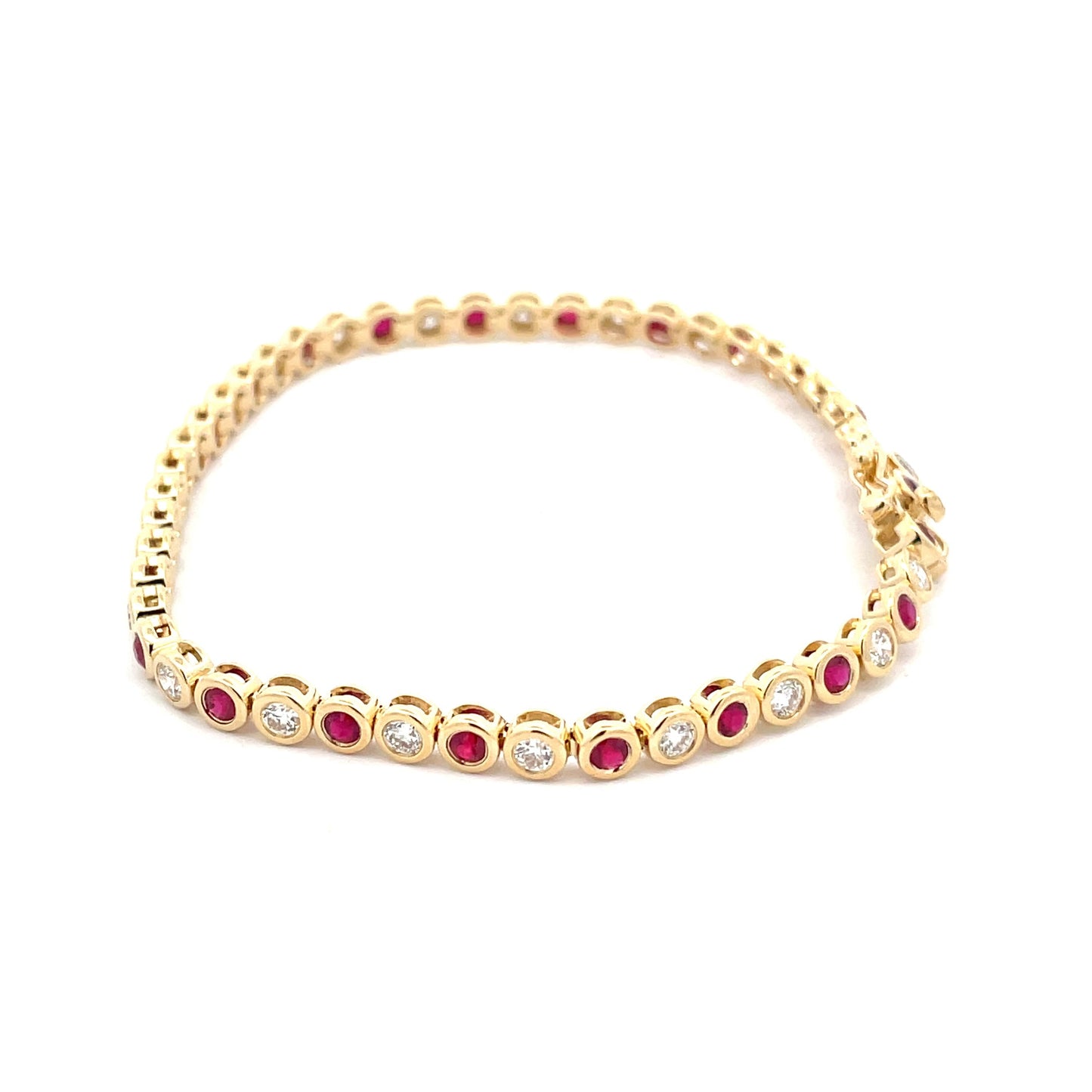 Ruby and Round Brilliant cut diamond, rub-over style tennis bracelet  Gardiner Brothers   