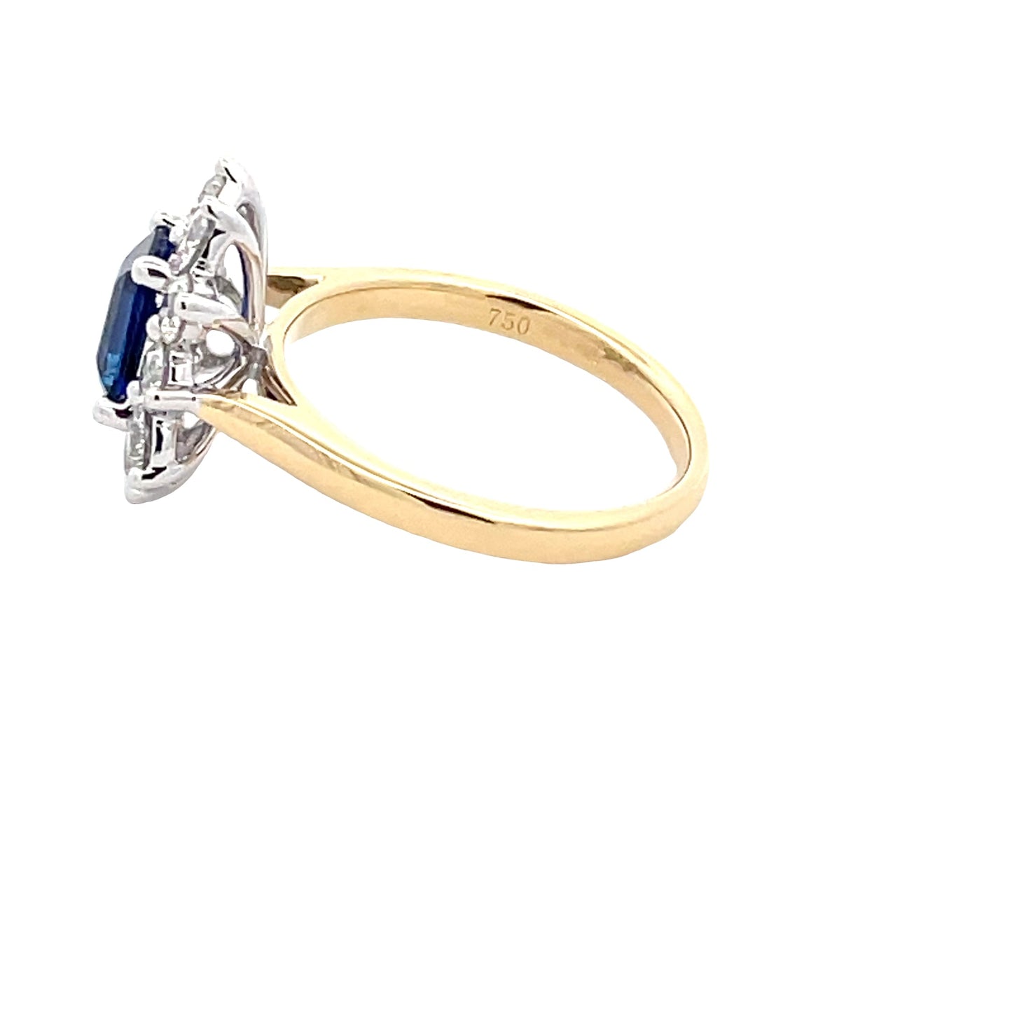 Octagonal Sapphire and round brilliant cut diamond cluster ring