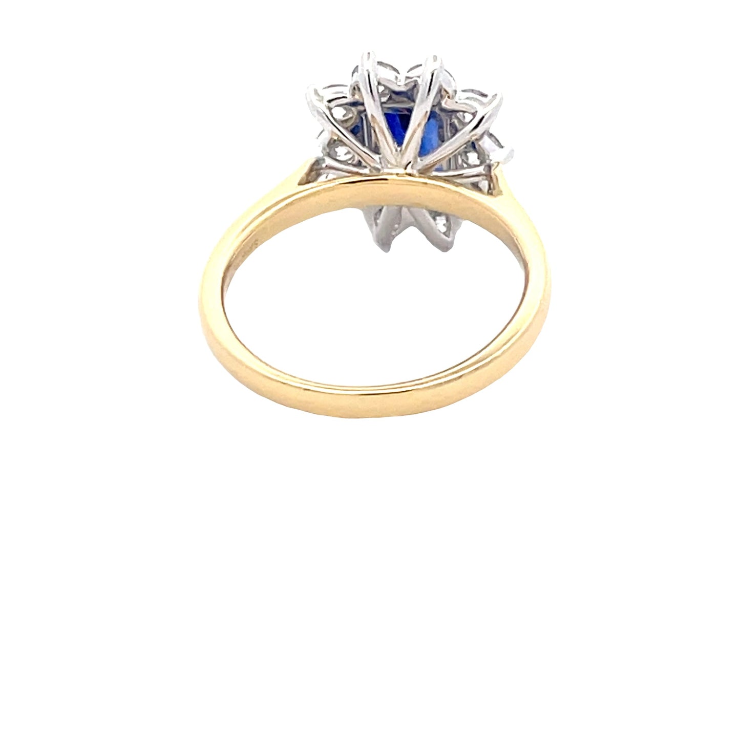 Octagonal Sapphire and round brilliant cut diamond cluster ring