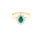 Emerald and round brilliant cut diamond cluster ring
