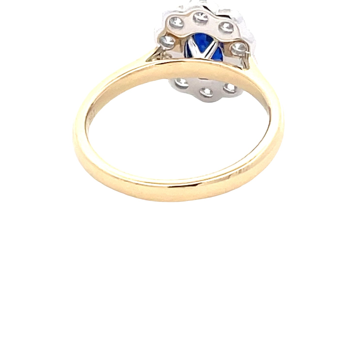 Oval Sapphire and Round Brilliant Cut Diamond Cluster Style Ring