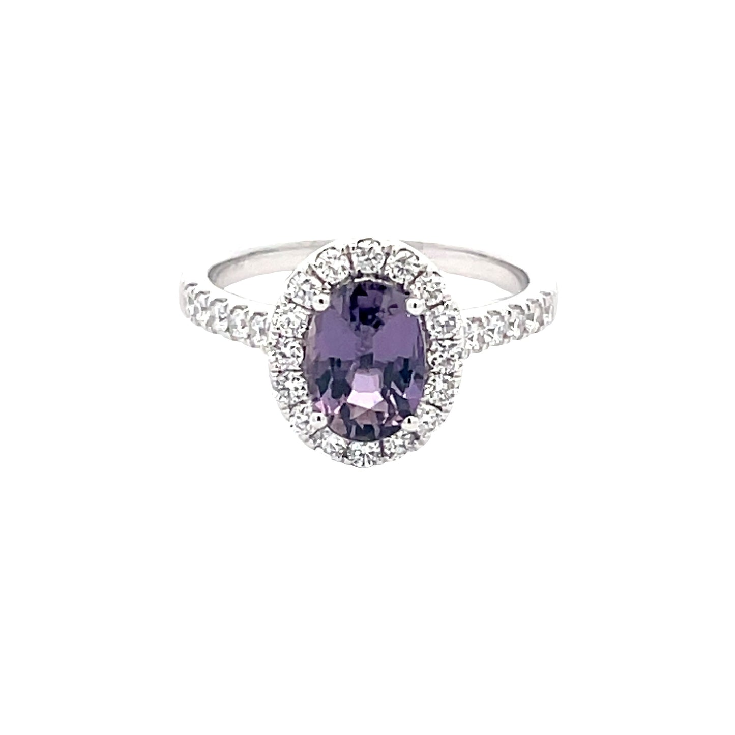 Purple sapphire and Round Brilliant Cut Diamond Halo Cluster Style Ring