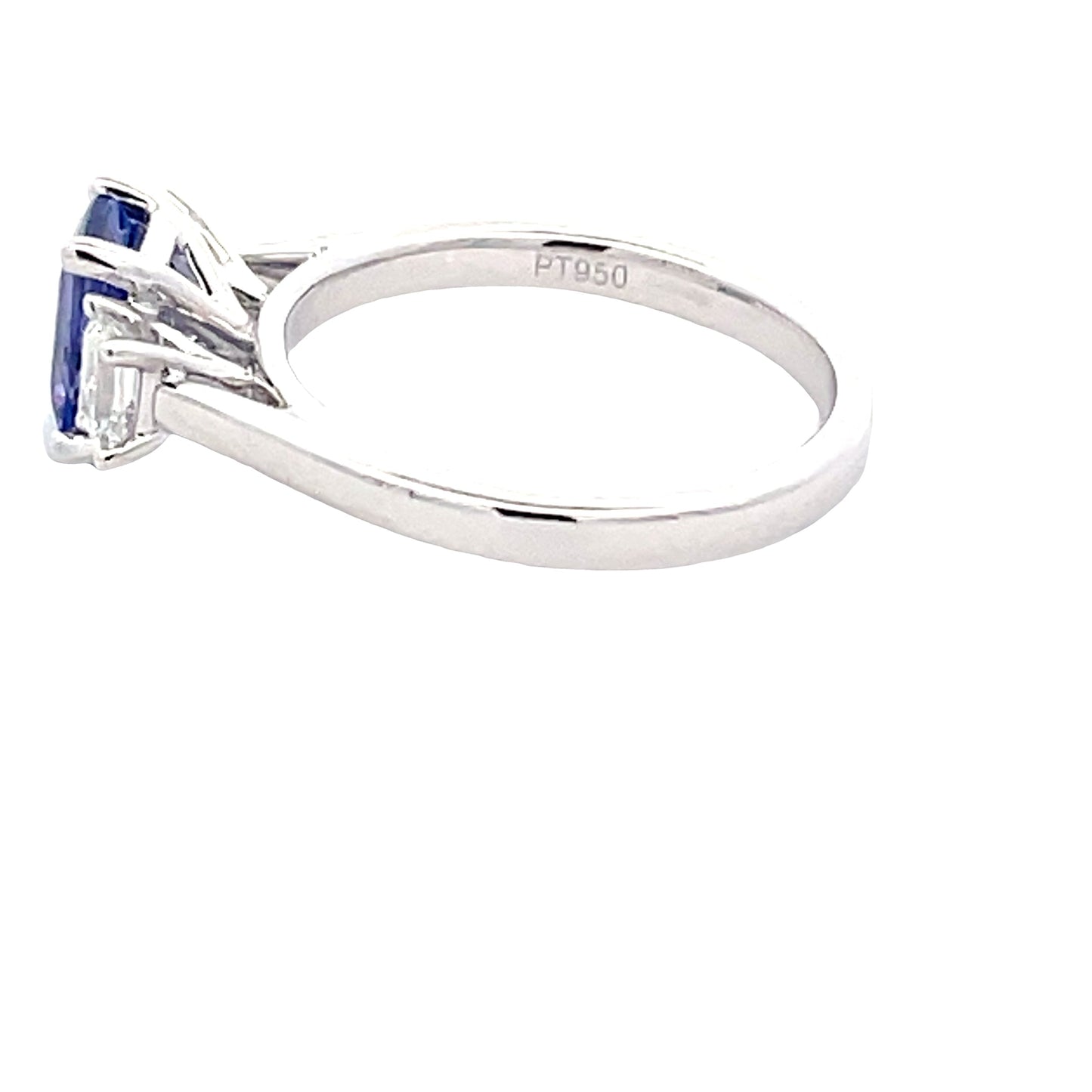 Octagonal Shaped Tanzanite and emerald cut diamond 3 stone ring