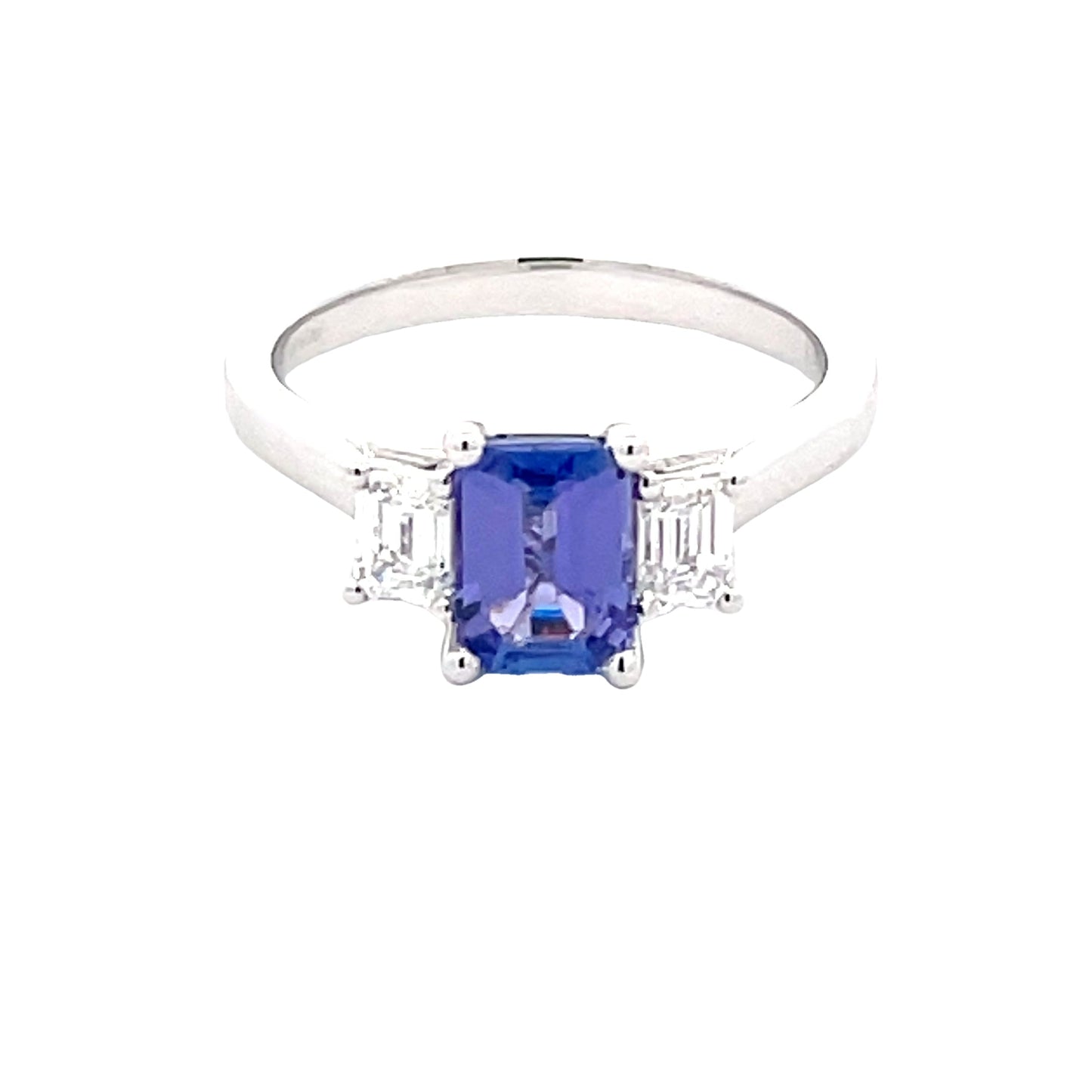 Octagonal Shaped Tanzanite and emerald cut diamond 3 stone ring