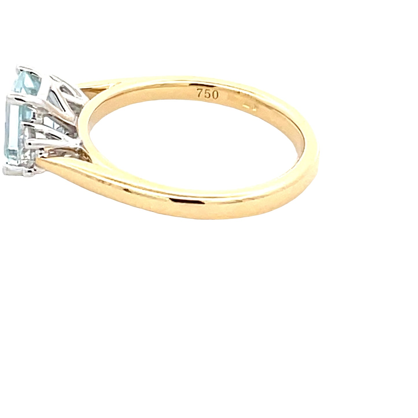 Octagonal Aquamarine and round brilliant cut diamond 3 stone ring