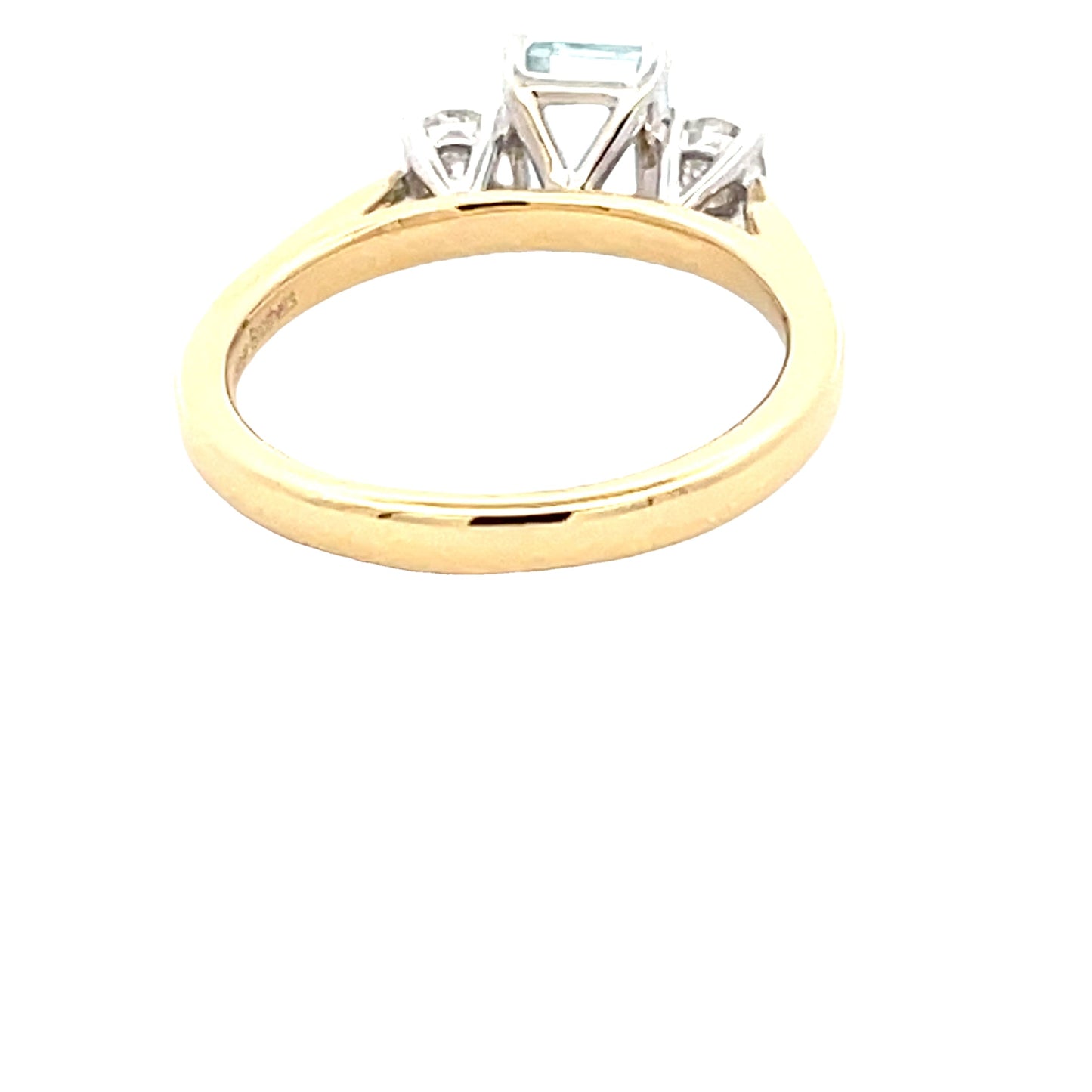 Octagonal Aquamarine and round brilliant cut diamond 3 stone ring