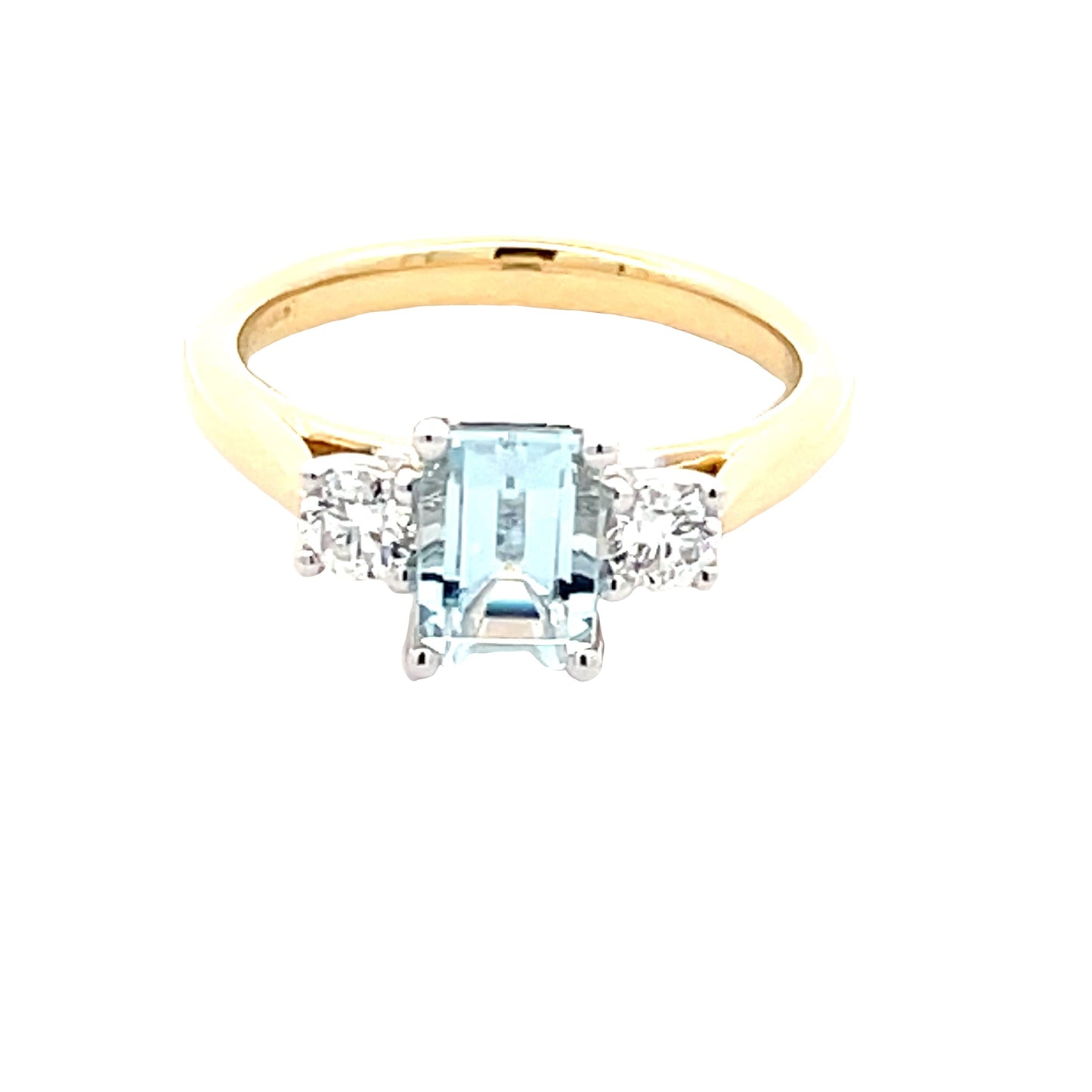 Octagonal Aquamarine and round brilliant cut diamond 3 stone ring