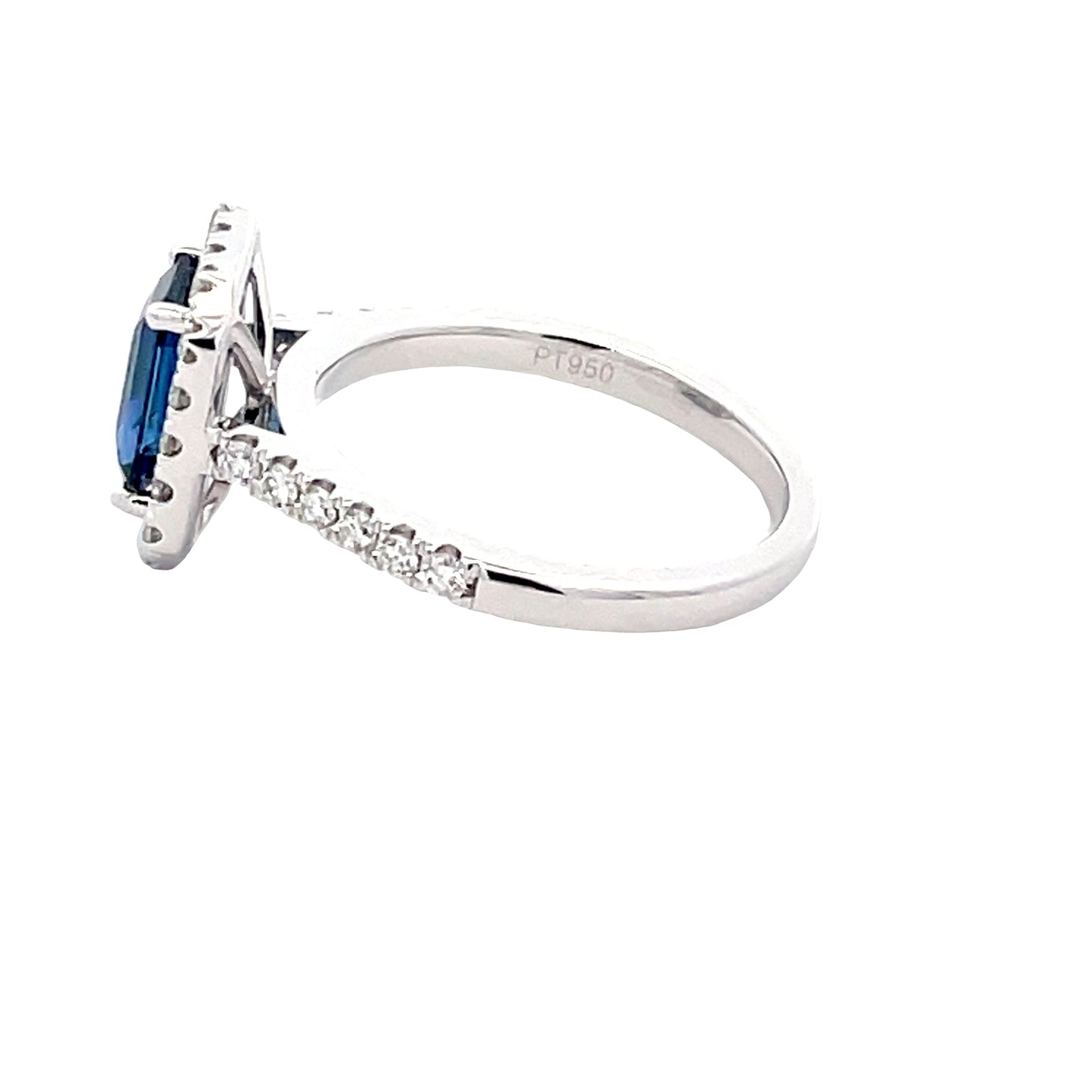 Octagonal Sapphire and round brilliant cut diamond halo cluster style ring