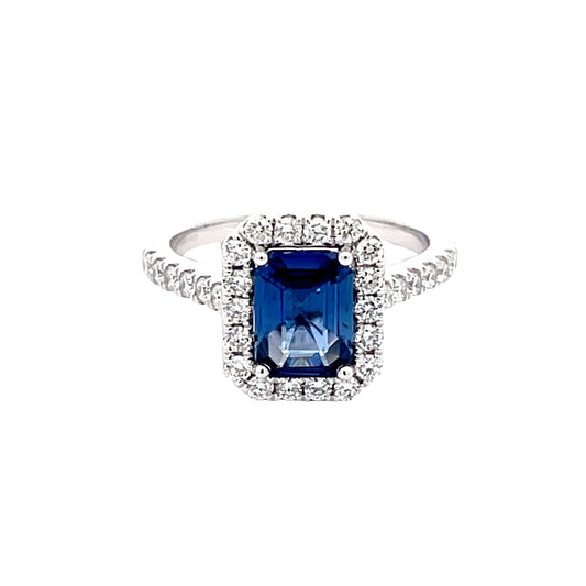 Octagonal Sapphire and round brilliant cut diamond halo cluster style ring