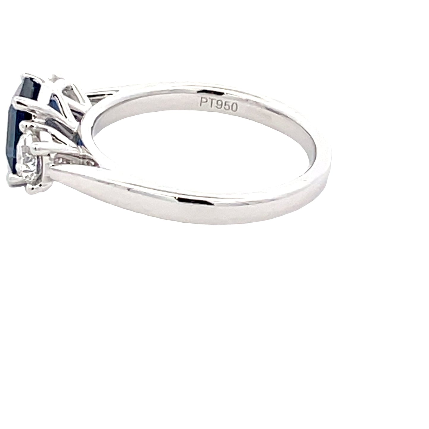 Octagonal Sapphire and round brilliant cut diamond 3 stone ring