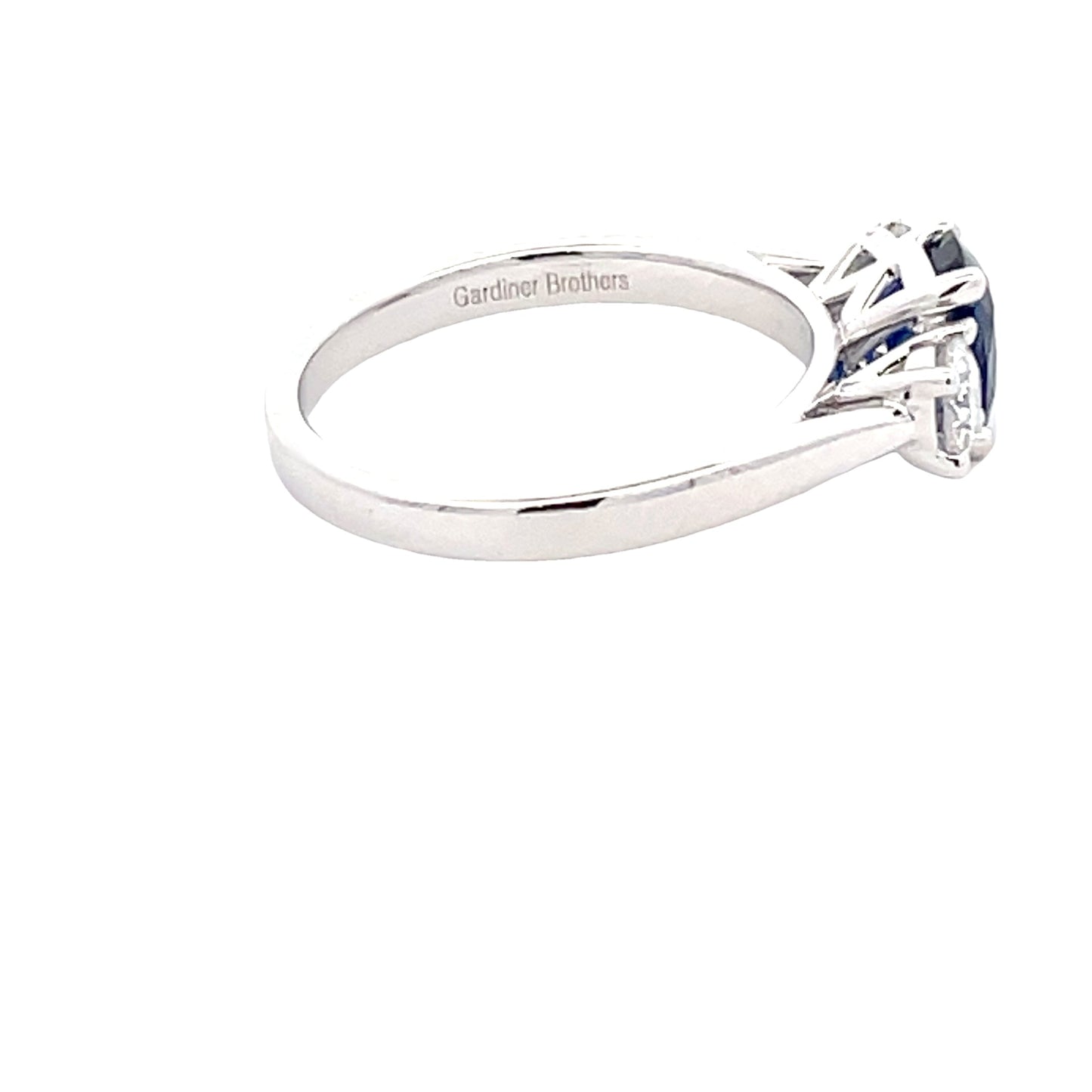 Cushion Shaped sapphire and round Brilliant Cut Diamond 3 Stone Ring