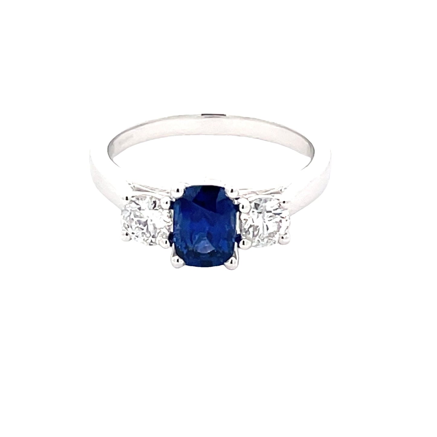 Cushion Shaped sapphire and round Brilliant Cut Diamond 3 Stone Ring