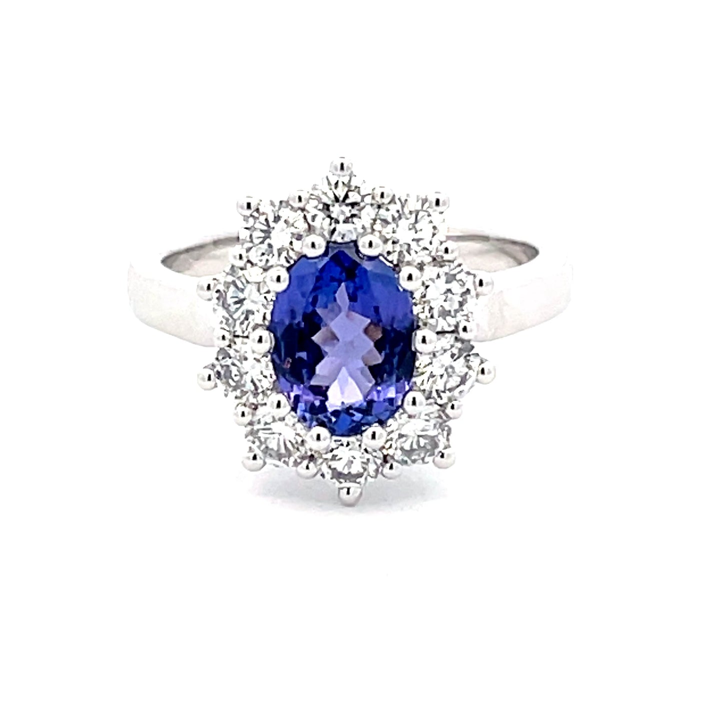 Oval Tanzanite and Round Brilliant Cut Diamond Cluster Ring