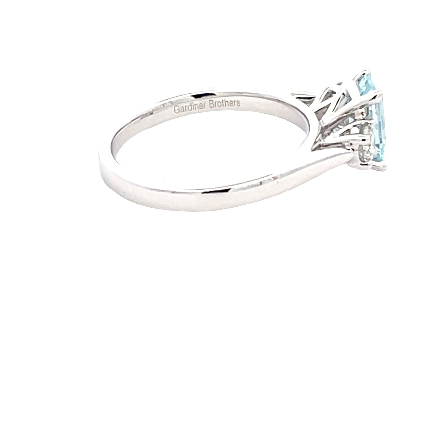 Octagonal Aquamarine and round brilliant cut diamond ring