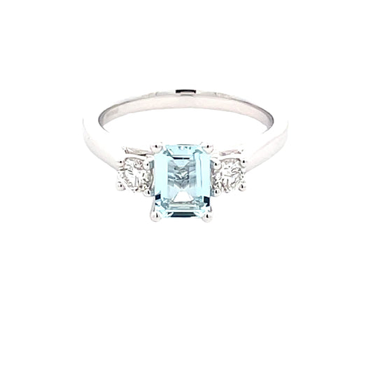 Octagonal Aquamarine and round brilliant cut diamond ring