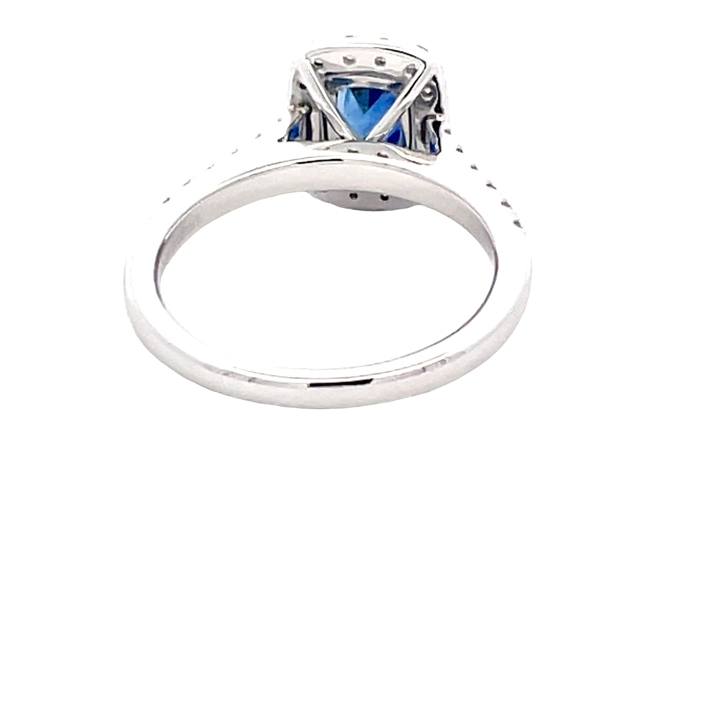 Cushion Shaped Sapphire and diamond halo cluster ring