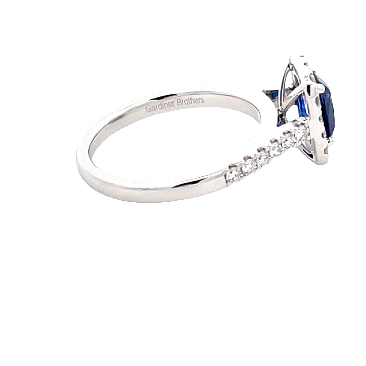 Cushion Shaped Sapphire and diamond halo cluster ring